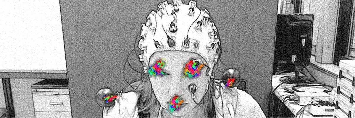 Eine Versuchsposition mir EEG-Mütze bei einem psycholigischen Experiment